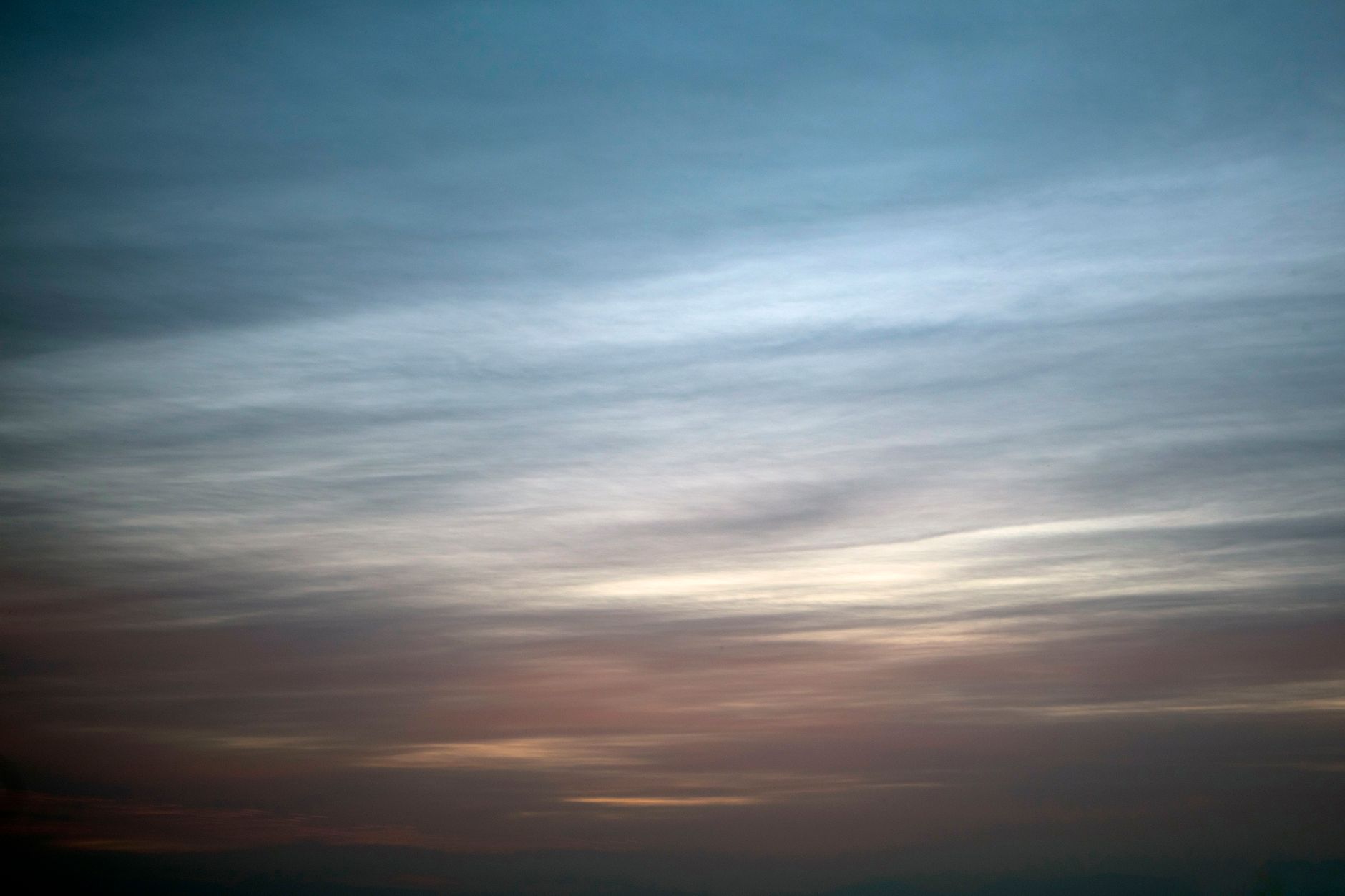 blue sky with gray clouds